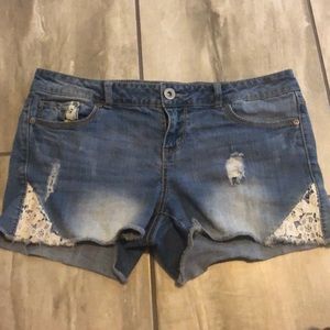 Denim shorts with lace accent